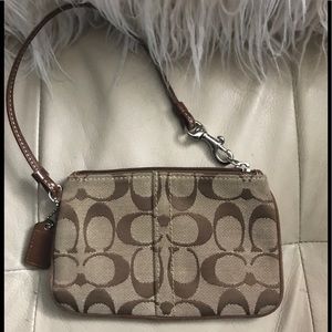 Coach wristlet in brown new